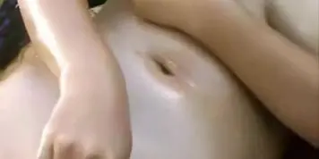 Busty Asian Beauty in Seductive Selfie Video